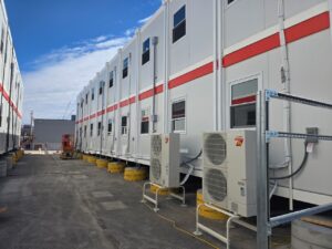 A modular, stackable temporary office facility on a large construction site in North America